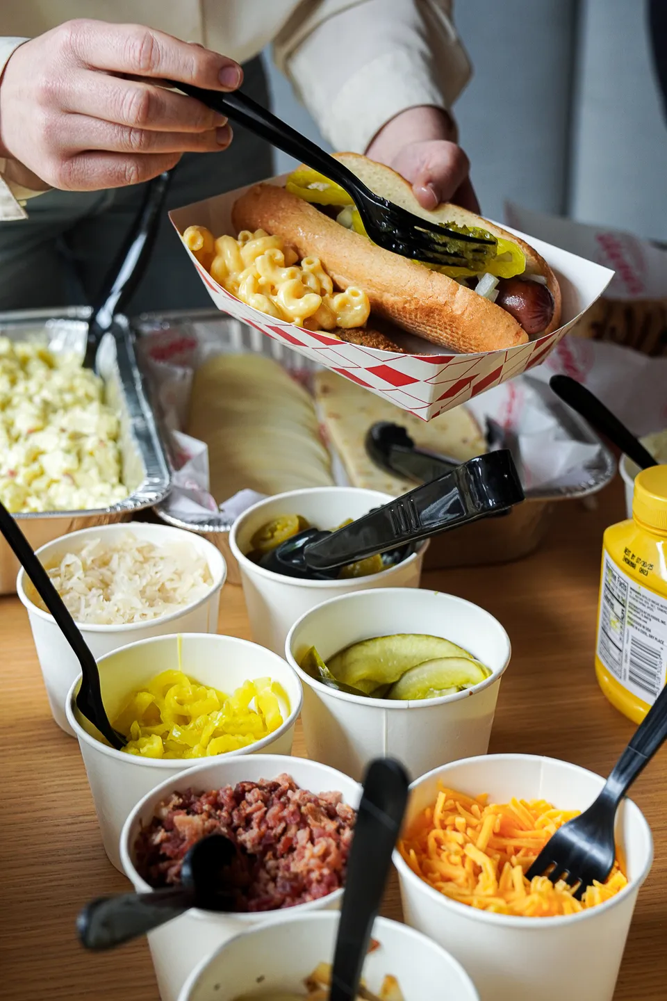 A Catering Spread with toppings, mustard and more